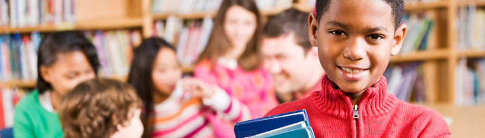 Students in their library. Students in their library.